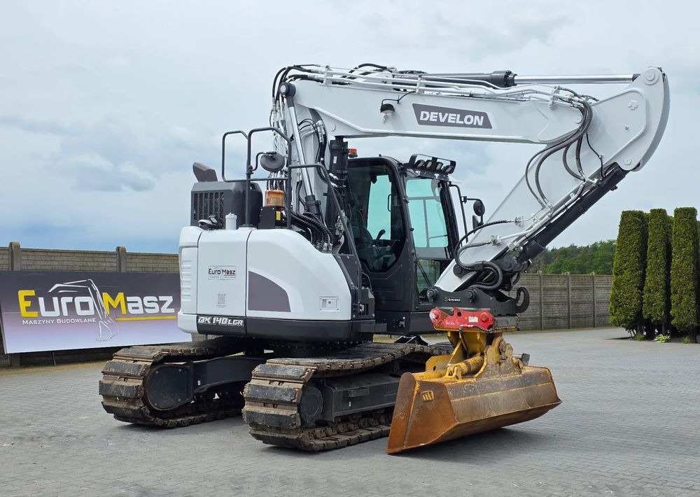 Doosan DX 140 LCR-7, 2023 ROK, 1030 MTH, OIL QUICK OQ65 - Lánctalpas kotró: 1 kép. Doosan DX 140 LCR-7, 2023 ROK, 1030 MTH, OIL QUICK OQ65 - Lánctalpas kotró: 1 kép.