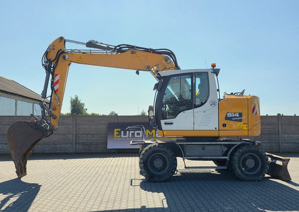 Liebherr A914 COMPACT, 2015 ROK, SW 48 szybkozłącze - Gumikerekes kotró: 2 kép. Liebherr A914 COMPACT, 2015 ROK, SW 48 szybkozłącze - Gumikerekes kotró: 2 kép.