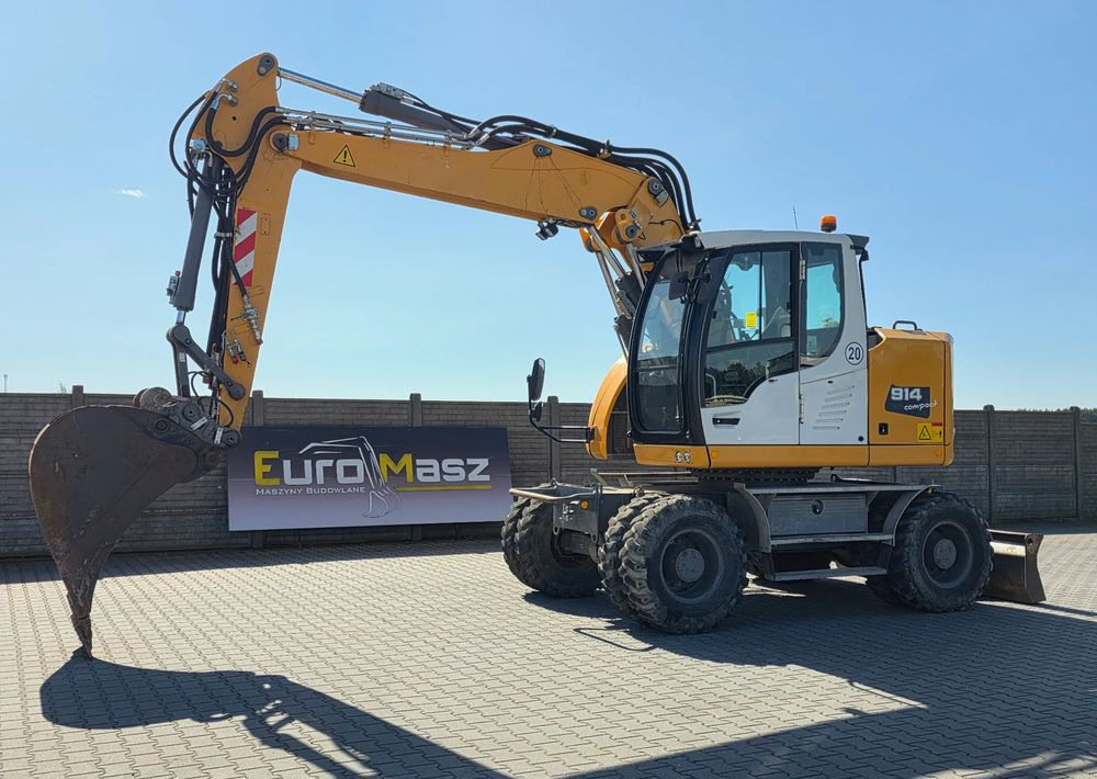 Liebherr A914 COMPACT, 2015 ROK, SW 48 szybkozłącze - Gumikerekes kotró: 1 kép. Liebherr A914 COMPACT, 2015 ROK, SW 48 szybkozłącze - Gumikerekes kotró: 1 kép.