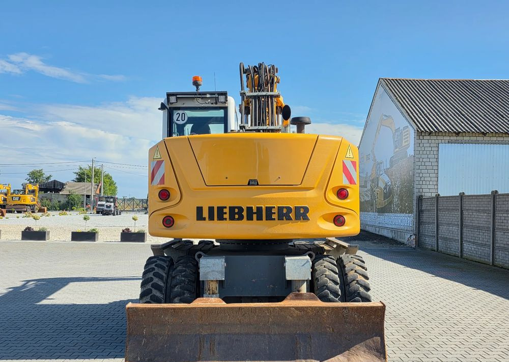 Liebherr A914 COMPACT, 2015 ROK, SW 48 szybkozłącze - Gumikerekes kotró: 4 kép. Liebherr A914 COMPACT, 2015 ROK, SW 48 szybkozłącze - Gumikerekes kotró: 4 kép.