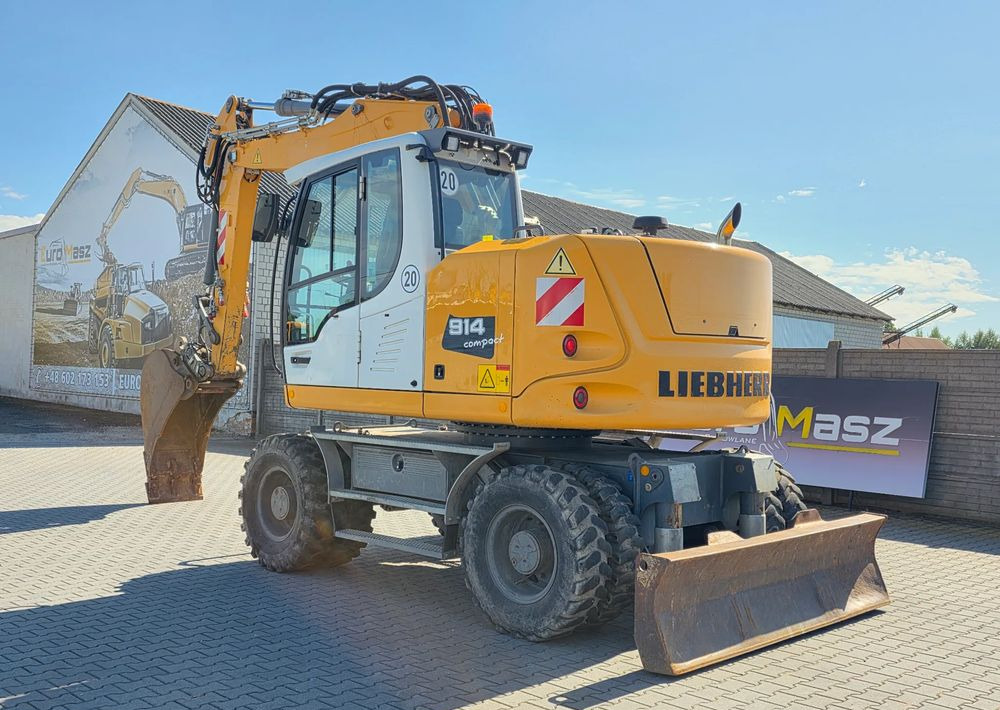 Liebherr A914 COMPACT, 2015 ROK, SW 48 szybkozłącze - Gumikerekes kotró: 3 kép. Liebherr A914 COMPACT, 2015 ROK, SW 48 szybkozłącze - Gumikerekes kotró: 3 kép.