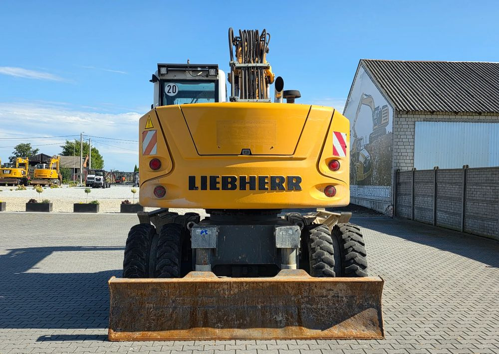 Liebherr A918 COMPACT, 2014 ROK, SW 48 LIKUFIX szybkozłącze - Gumikerekes kotró: 4 kép. Liebherr A918 COMPACT, 2014 ROK, SW 48 LIKUFIX szybkozłącze - Gumikerekes kotró: 4 kép.