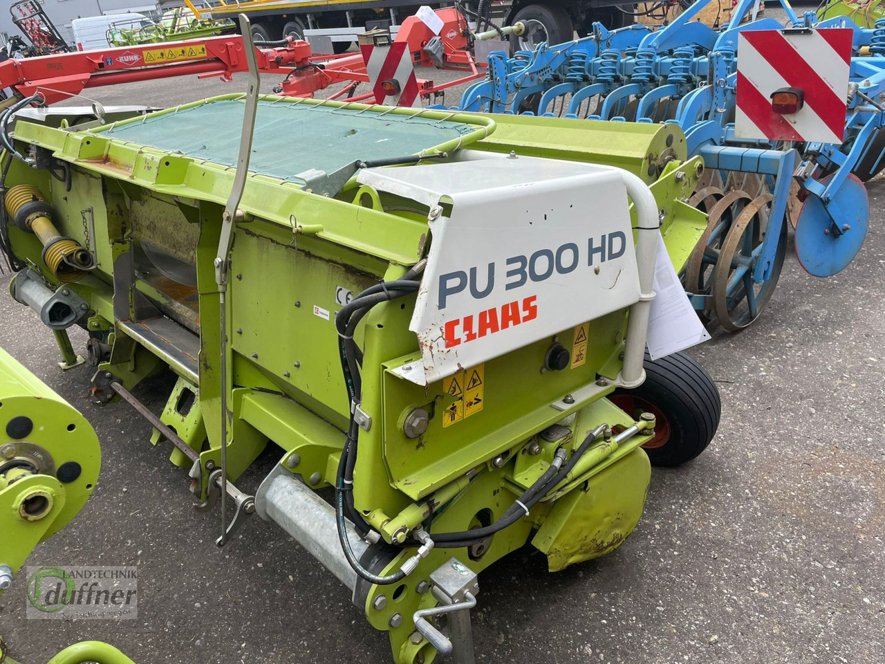 CLAAS PU 300 HD - Takarmánybetakarító gép: 2 kép. CLAAS PU 300 HD - Takarmánybetakarító gép: 2 kép.