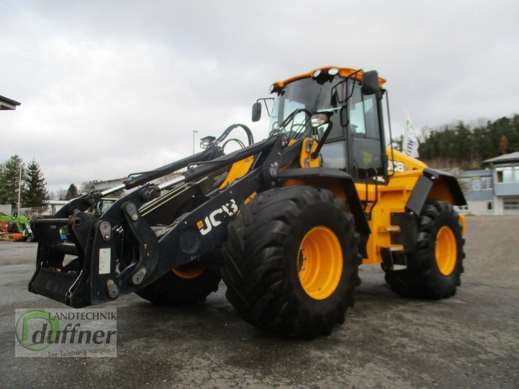 Gumikerekes homlokrakodó JCB 435 S Agri: 9 kép.