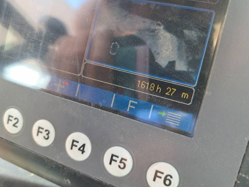 Hulladék kotró a következők szállításához hulladék Fuchs MHL 335: 13 kép. Hulladék kotró a következők szállításához hulladék Fuchs MHL 335: 13 kép.