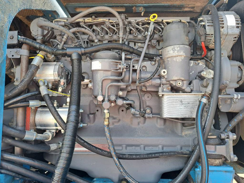 Hulladék kotró a következők szállításához hulladék Fuchs MHL 335: 11 kép. Hulladék kotró a következők szállításához hulladék Fuchs MHL 335: 11 kép.