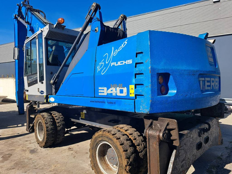 Fuchs MHL 340 D - Hulladék kotró: 1 kép. Fuchs MHL 340 D - Hulladék kotró: 1 kép.