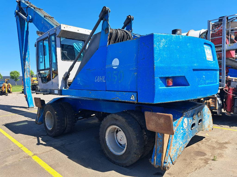 Fuchs MHL 350 - Hulladék kotró: 1 kép. Fuchs MHL 350 - Hulladék kotró: 1 kép.