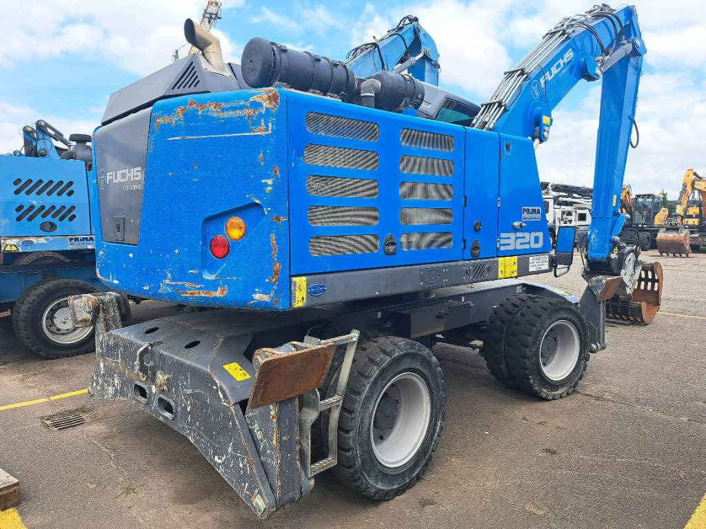 Fuchs MHL320F + Grapple - Hulladék kotró: 5 kép. Fuchs MHL320F + Grapple - Hulladék kotró: 5 kép.