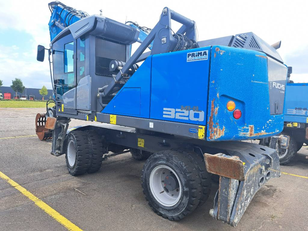 Fuchs MHL320F + Grapple - Hulladék kotró: 4 kép. Fuchs MHL320F + Grapple - Hulladék kotró: 4 kép.