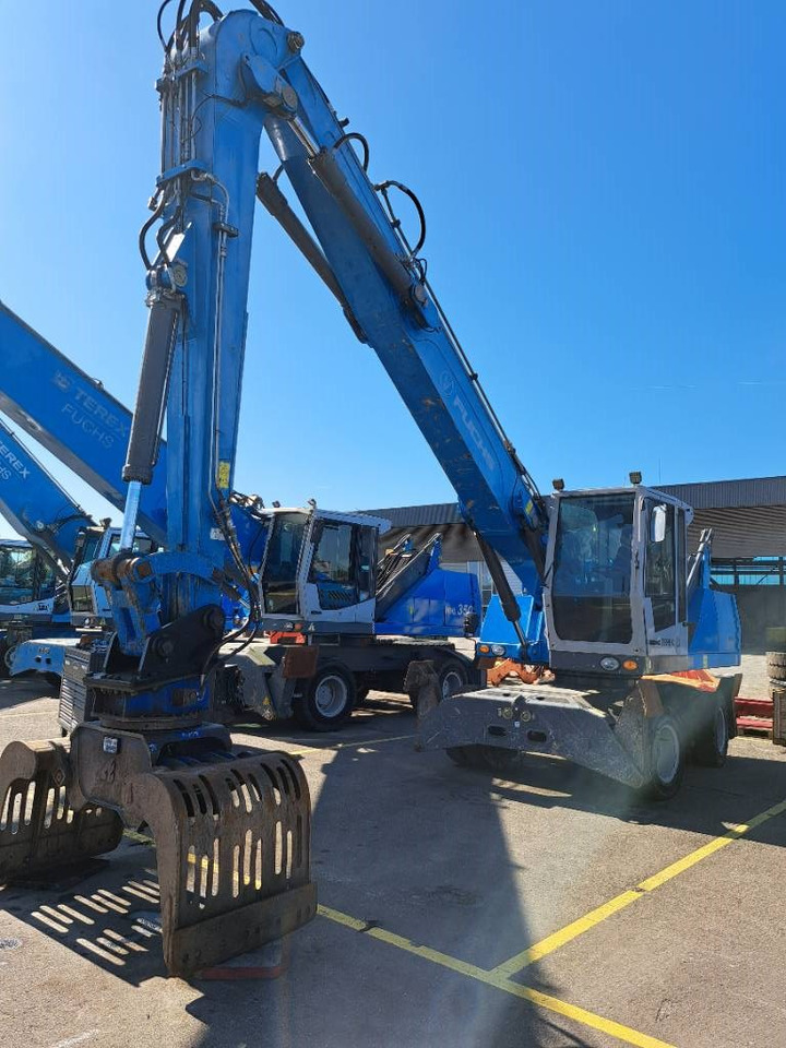 Fuchs MHL331E + Grapple - Hulladék kotró: 4 kép. Fuchs MHL331E + Grapple - Hulladék kotró: 4 kép.