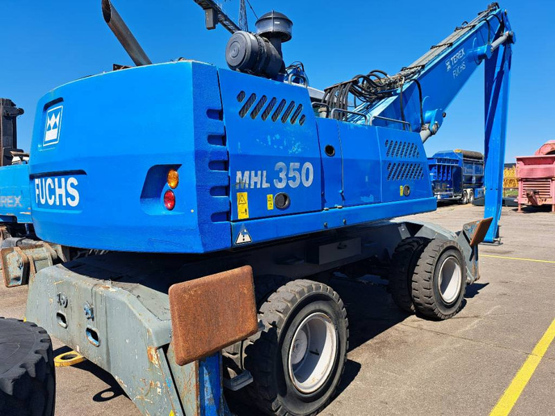 Fuchs MHL350D - Hulladék kotró: 2 kép. Fuchs MHL350D - Hulladék kotró: 2 kép.