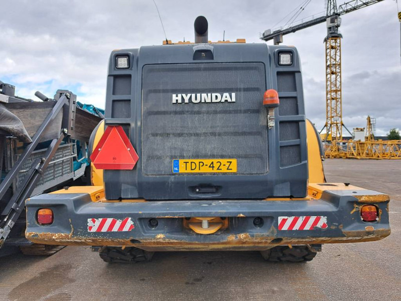 Hyundai HL980XT - Gumikerekes homlokrakodó: 4 kép. Hyundai HL980XT - Gumikerekes homlokrakodó: 4 kép.