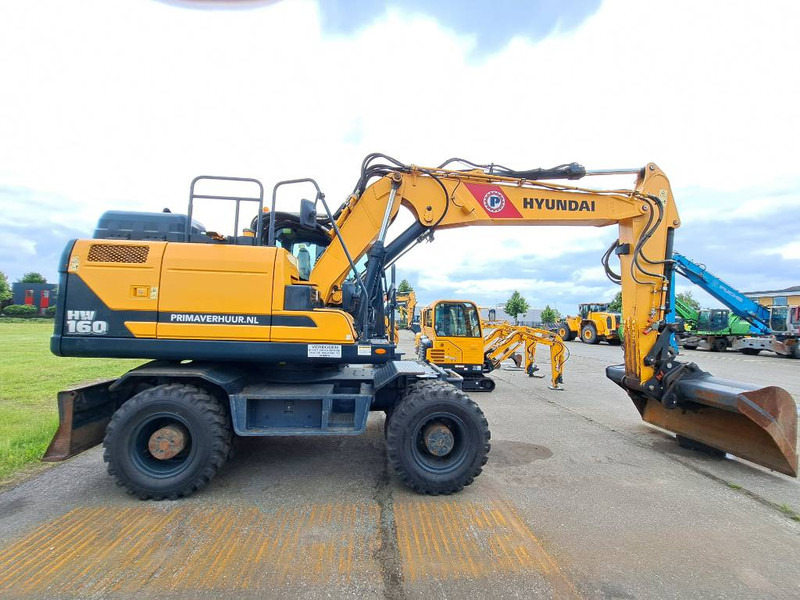 Hyundai HW 160 - Gumikerekes kotró: 5 kép. Hyundai HW 160 - Gumikerekes kotró: 5 kép.