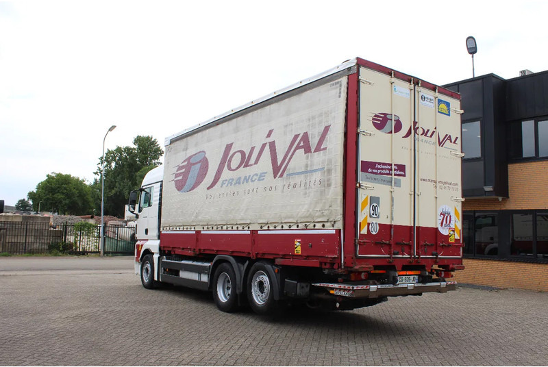 MAN TGX 26.440 * EURO5 * 6X2 * LIFT AXLE * - Ponyvás teherautó: 3 kép. MAN TGX 26.440 * EURO5 * 6X2 * LIFT AXLE * - Ponyvás teherautó: 3 kép.