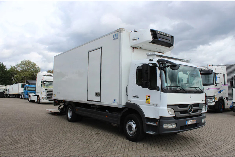 Mercedes-Benz Atego 1318 * MANUAL * CARRIER SUPRA 550 - Hűtős teherautó: 4 kép. Mercedes-Benz Atego 1318 * MANUAL * CARRIER SUPRA 550 - Hűtős teherautó: 4 kép.