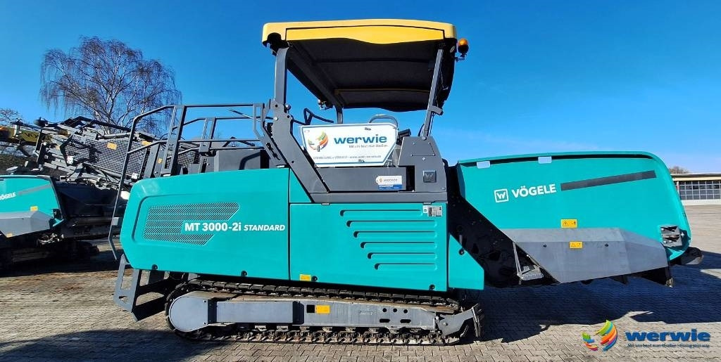 Vögele MT 3000-2i - Útburkológép: 1 kép. Vögele MT 3000-2i - Útburkológép: 1 kép.