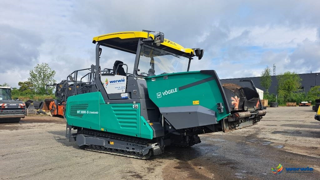 Vögele MT 3000-3i - Aszfaltozó gép: 2 kép. Vögele MT 3000-3i - Aszfaltozó gép: 2 kép.