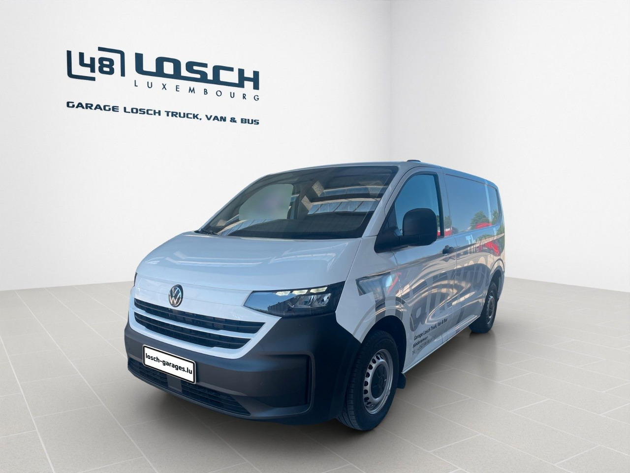 Volkswagen T7 Transporter 2.0 TDI 81 kW Kasten - Furgon: 1 kép. Volkswagen T7 Transporter 2.0 TDI 81 kW Kasten - Furgon: 1 kép.