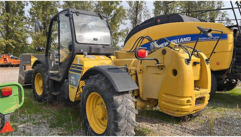 Komatsu WH 713 - Teleszkópos rakodó: 4 kép. Komatsu WH 713 - Teleszkópos rakodó: 4 kép.