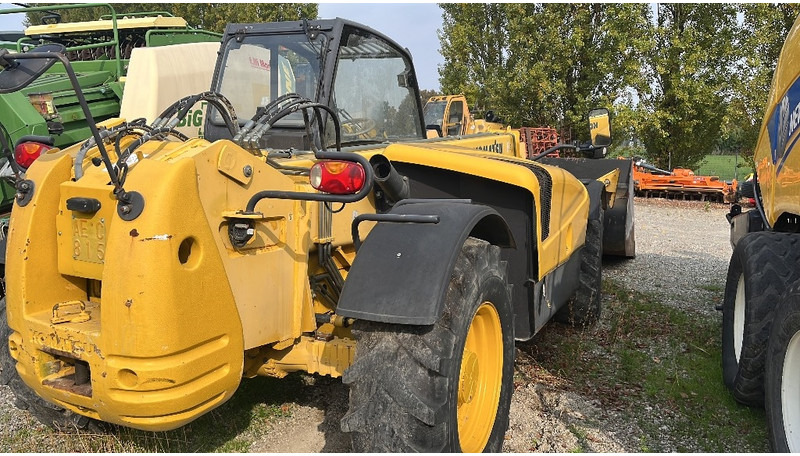 Komatsu WH 713 - Teleszkópos rakodó: 5 kép. Komatsu WH 713 - Teleszkópos rakodó: 5 kép.