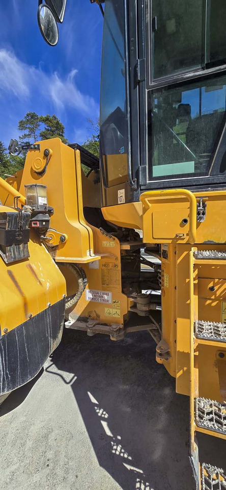 Gumikerekes homlokrakodó HYUNDAI HL970: 10 kép.