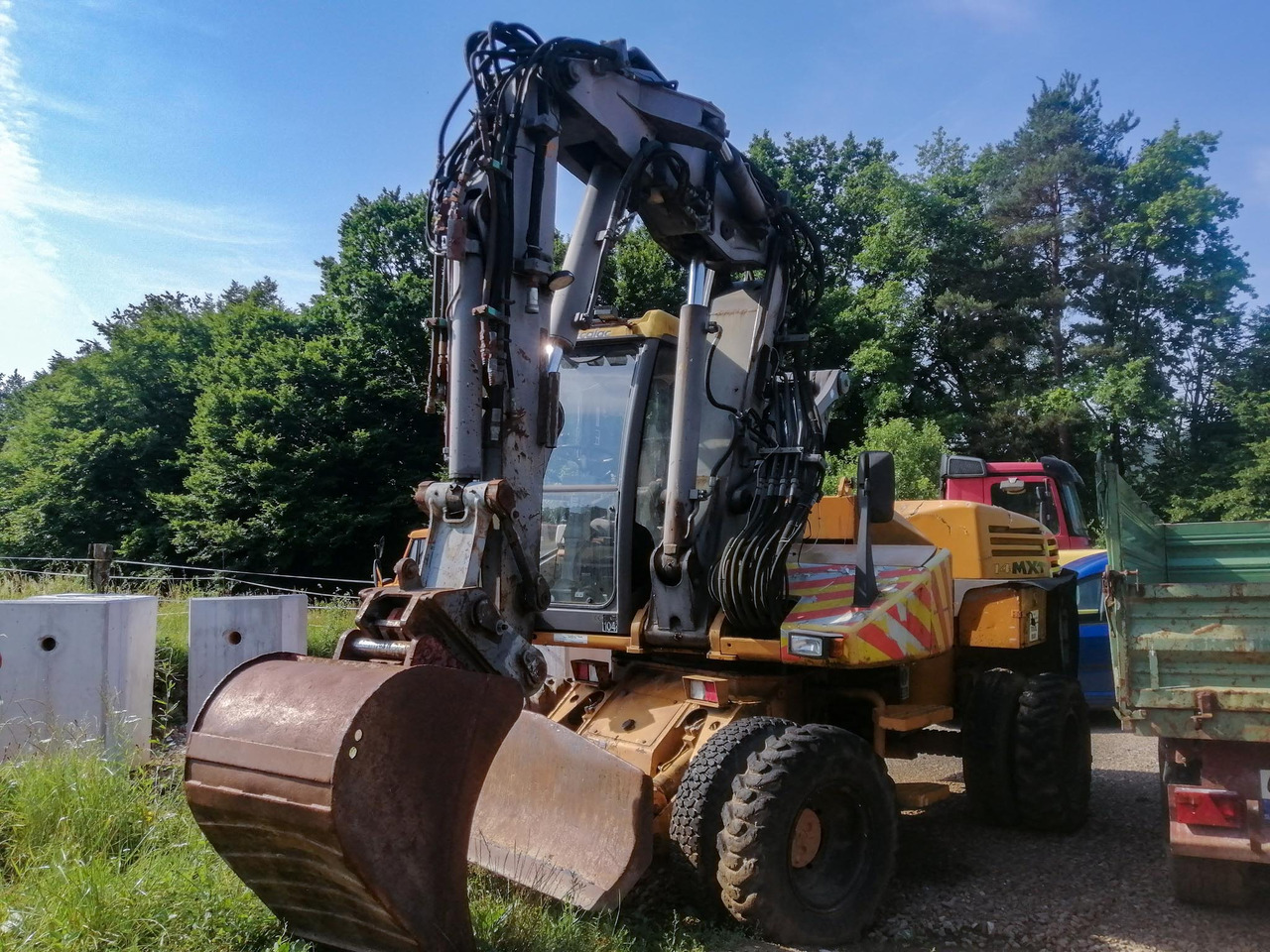 MECALAC 14 MXT - Gumikerekes kotró: 1 kép. MECALAC 14 MXT - Gumikerekes kotró: 1 kép.