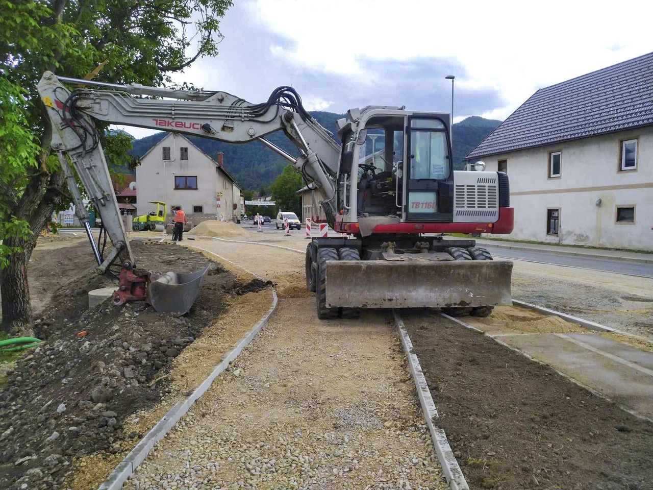 Takeuchi TB1160W - Gumikerekes kotró: 1 kép. Takeuchi TB1160W - Gumikerekes kotró: 1 kép.