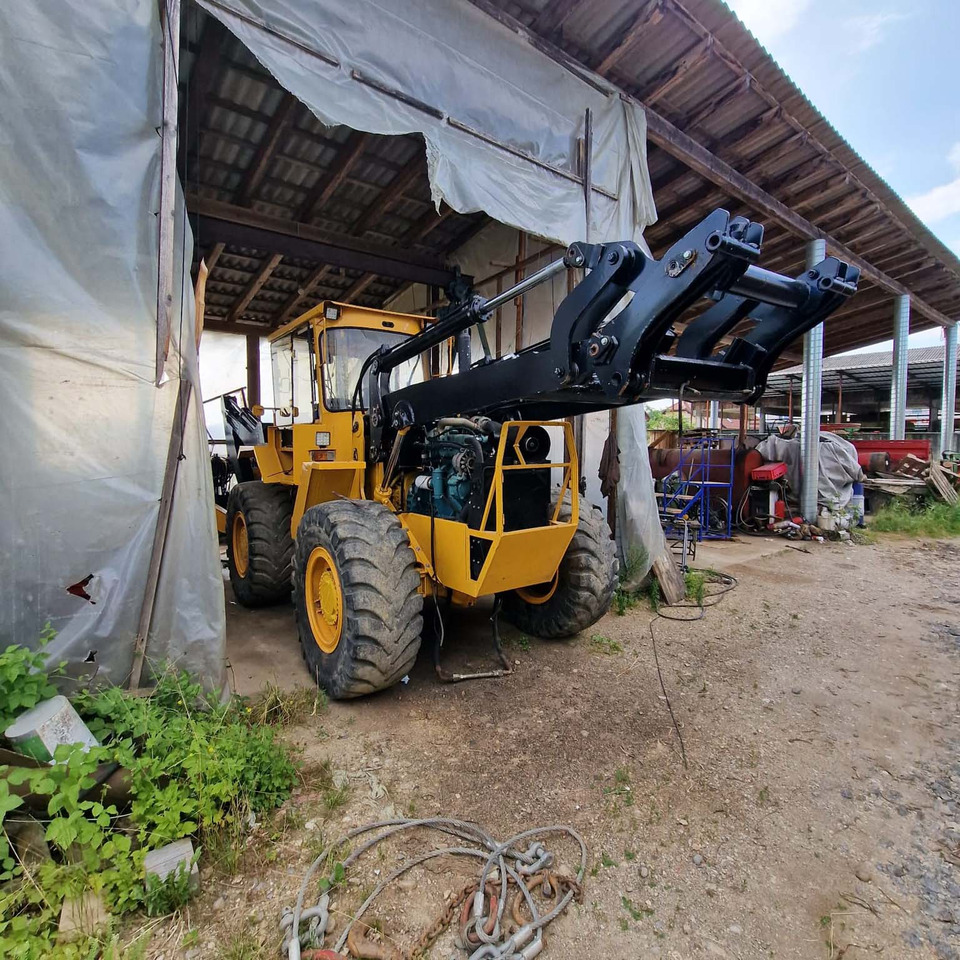 Volvo BM6300 - Kotrórakodó: 3 kép. Volvo BM6300 - Kotrórakodó: 3 kép.