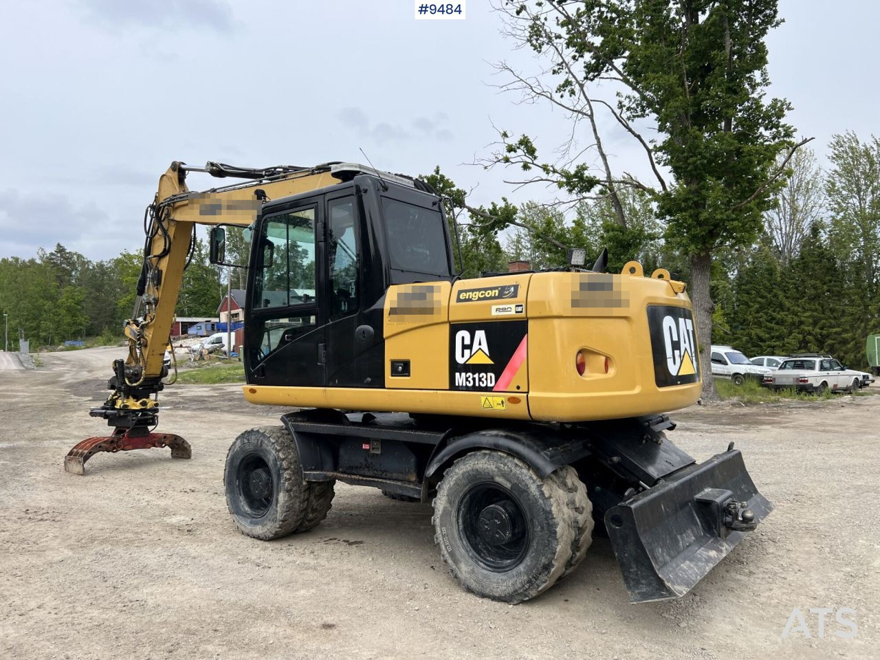 CAT M313D with tipping wagon and attachments (VIDEO) - Gumikerekes kotró: 5 kép. CAT M313D with tipping wagon and attachments (VIDEO) - Gumikerekes kotró: 5 kép.