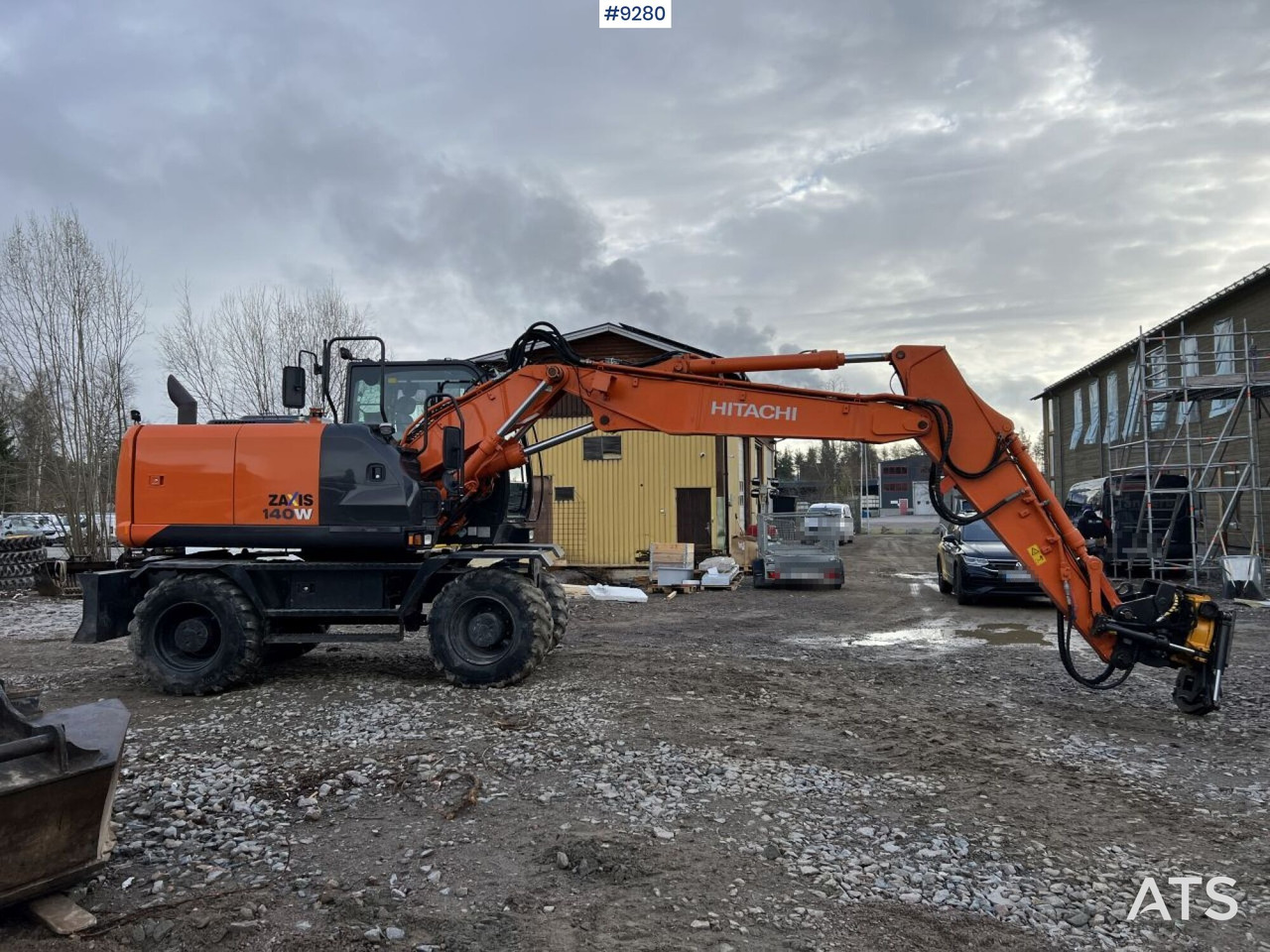Hitachi ZX 140 W-5B wheeled excavator with gears (VIDEO) - Gumikerekes kotró: 2 kép. Hitachi ZX 140 W-5B wheeled excavator with gears (VIDEO) - Gumikerekes kotró: 2 kép.