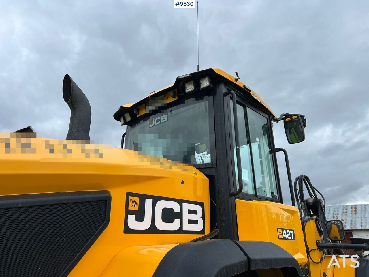 Gumikerekes homlokrakodó JCB 427 HT Wheel loader with gears: 12 kép.