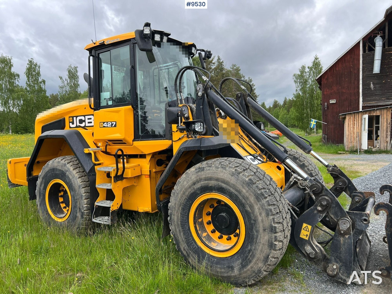 Gumikerekes homlokrakodó JCB 427 HT Wheel loader with gears: 7 kép.