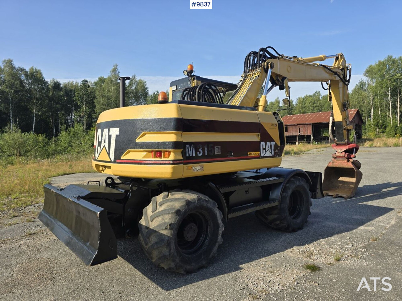 Wheel Excavator CAT M315 (See Video) - Gumikerekes kotró: 3 kép. Wheel Excavator CAT M315 (See Video) - Gumikerekes kotró: 3 kép.