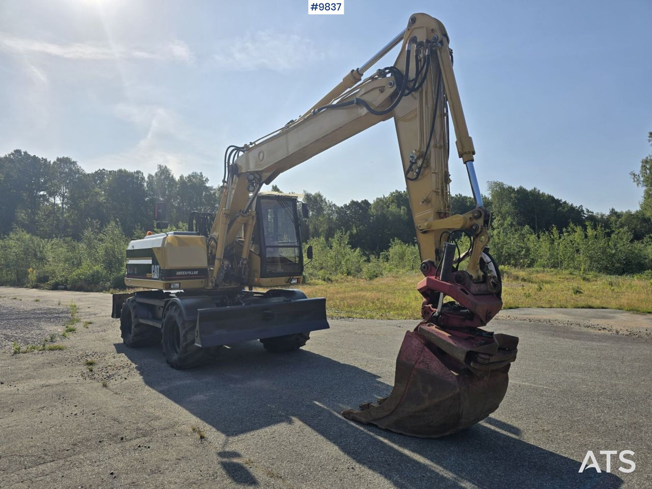 Wheel Excavator CAT M315 (See Video) - Gumikerekes kotró: 5 kép. Wheel Excavator CAT M315 (See Video) - Gumikerekes kotró: 5 kép.