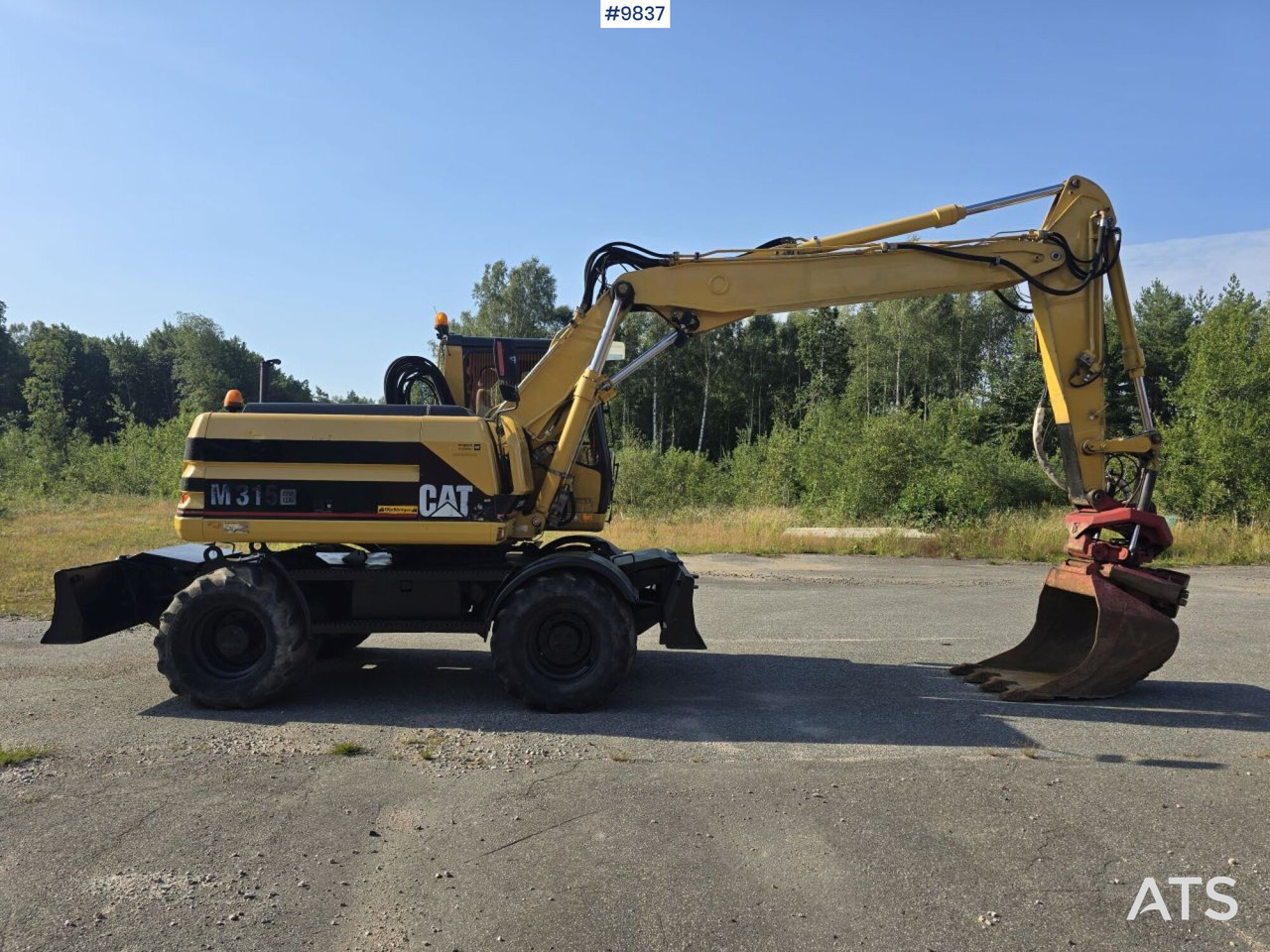Wheel Excavator CAT M315 (See Video) - Gumikerekes kotró: 2 kép. Wheel Excavator CAT M315 (See Video) - Gumikerekes kotró: 2 kép.