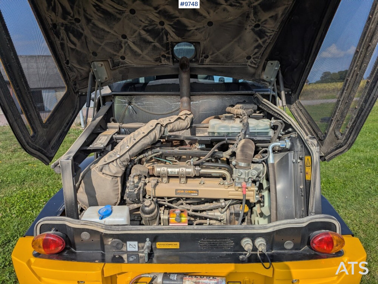 Gumikerekes homlokrakodó Wheel loader JCB 409 Stage V Nordic Edition 40km/h with attachments: 6 kép.