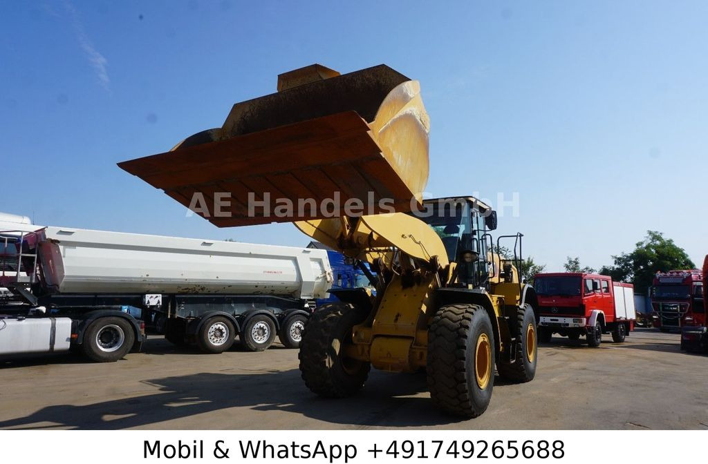 CAT 962 M Wheelloader *4m³-Schaufel / Klima / Kamera - Gumikerekes homlokrakodó: 4 kép. CAT 962 M Wheelloader *4m³-Schaufel / Klima / Kamera - Gumikerekes homlokrakodó: 4 kép.
