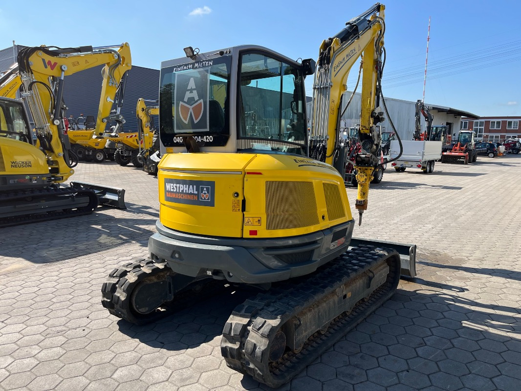 Neuson EZ50 - Minikotró: 2 kép. Neuson EZ50 - Minikotró: 2 kép.