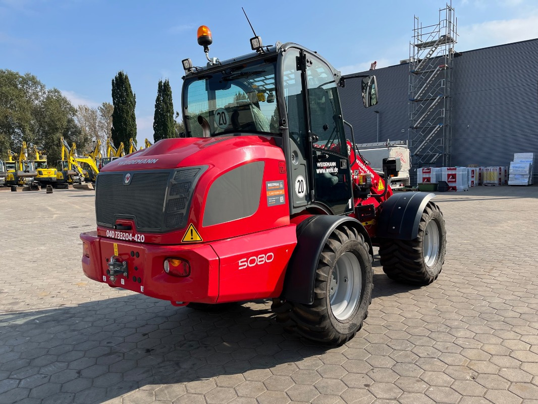 Weidemann WM5080 - Gumikerekes homlokrakodó: 2 kép. Weidemann WM5080 - Gumikerekes homlokrakodó: 2 kép.