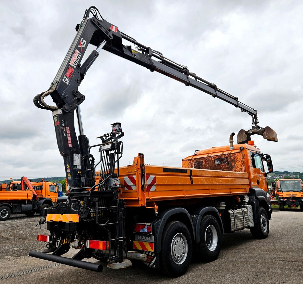 MAN TGS 28.360 6x4-4 HIAB 144E-4 Kran Euro5 - Billenőplatós teherautó, Darus autó: 4 kép. MAN TGS 28.360 6x4-4 HIAB 144E-4 Kran Euro5 - Billenőplatós teherautó, Darus autó: 4 kép.