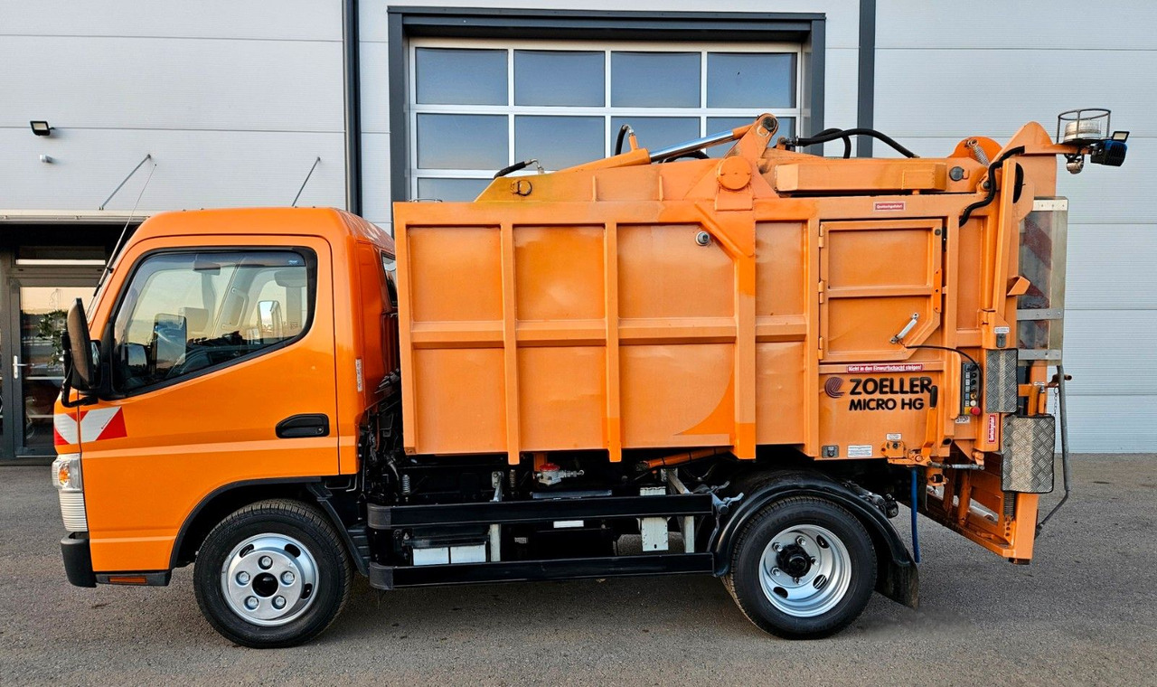 Mitsubishi Fuso Canter 6S15 Zoeller Micro Müllpresse - Szemetesautó: 2 kép. Mitsubishi Fuso Canter 6S15 Zoeller Micro Müllpresse - Szemetesautó: 2 kép.