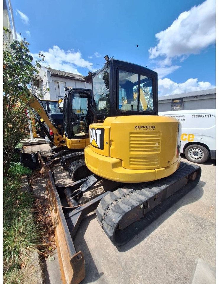 CAT 305E2CR - Lánctalpas kotró: 3 kép. CAT 305E2CR - Lánctalpas kotró: 3 kép.