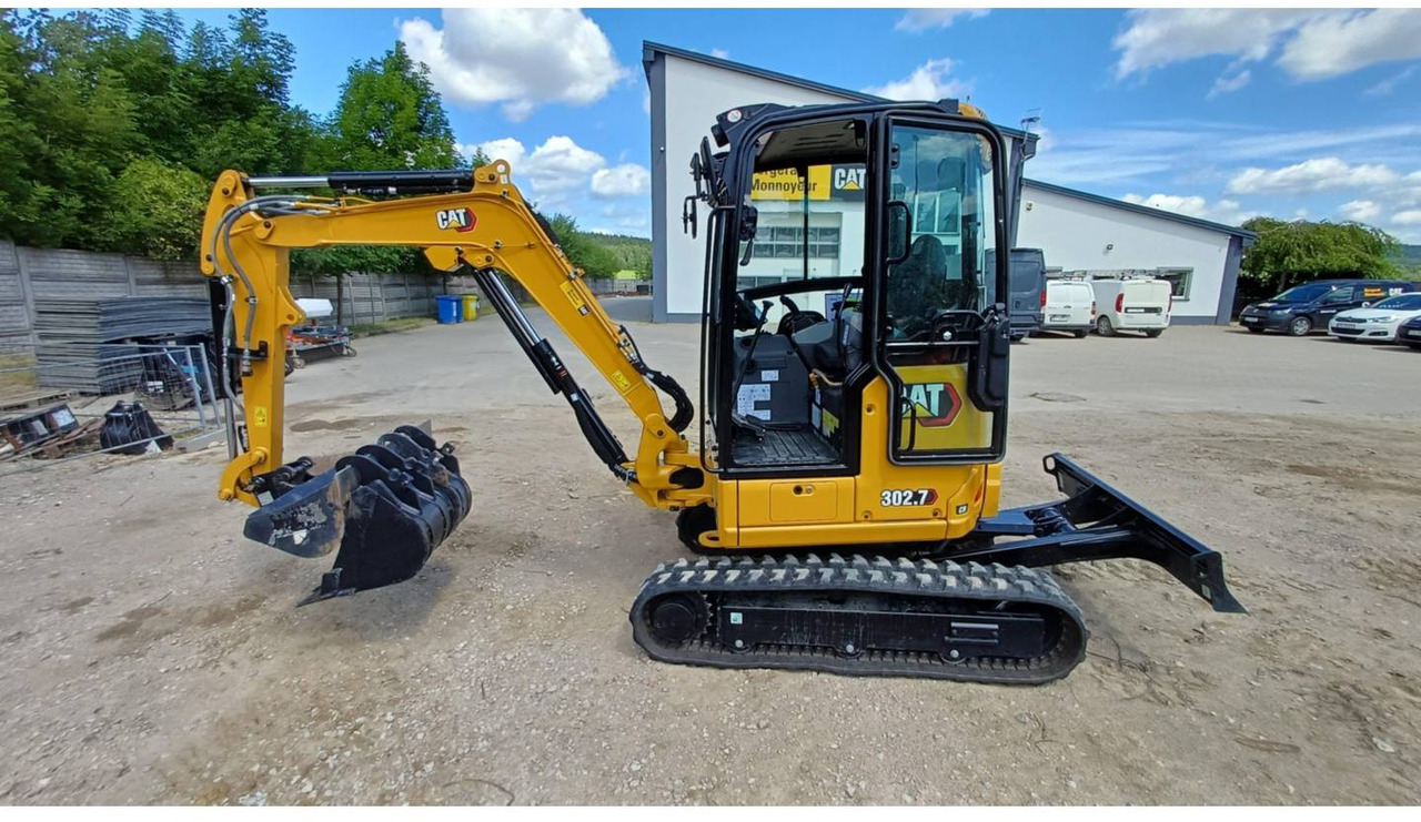 CAT 302.7CR - Lánctalpas kotró: 2 kép. CAT 302.7CR - Lánctalpas kotró: 2 kép.