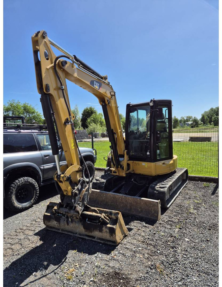 CAT 305.5E2CR - Lánctalpas kotró: 1 kép. CAT 305.5E2CR - Lánctalpas kotró: 1 kép.