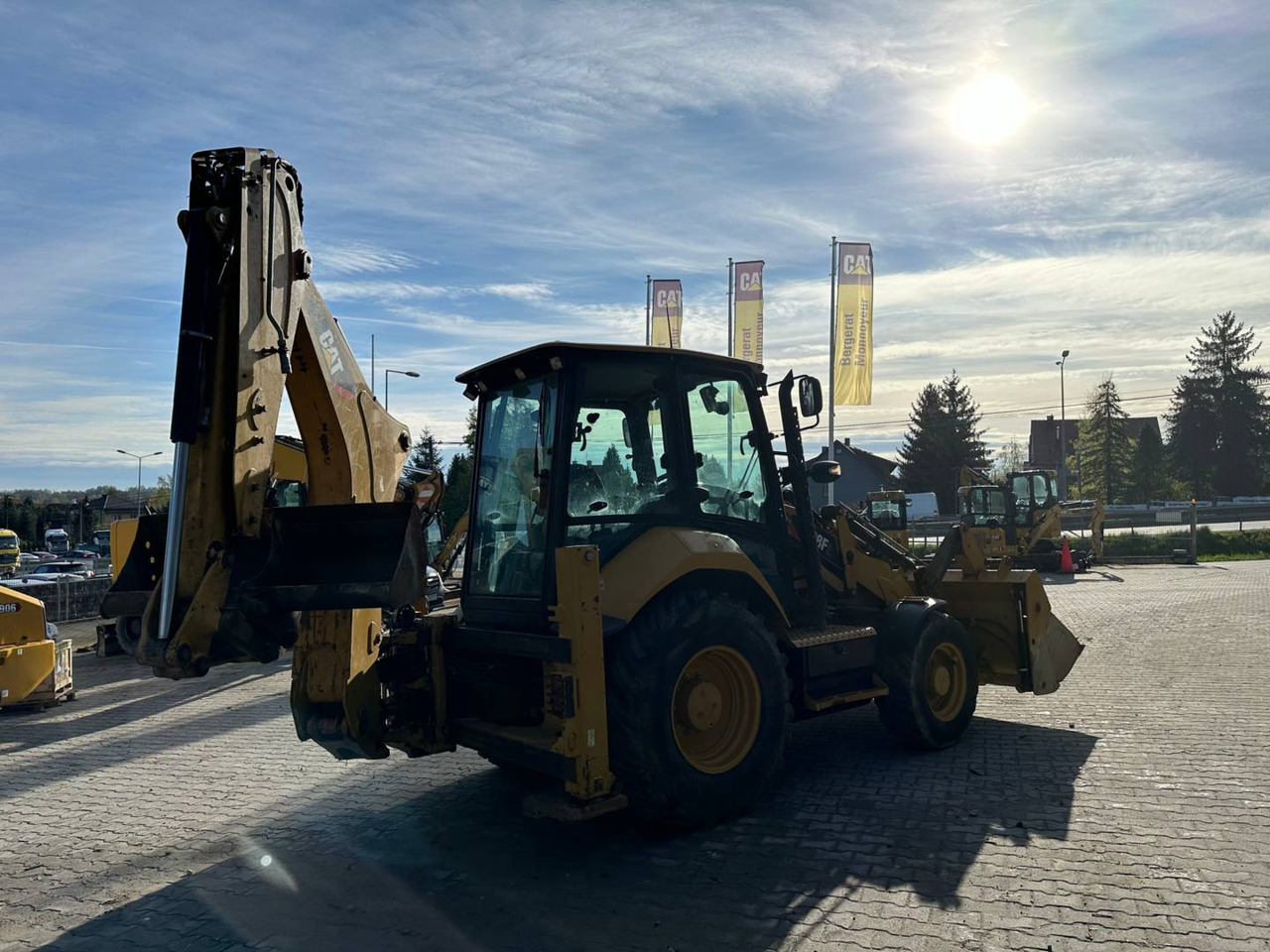 CAT 428F2 - Kotrórakodó: 3 kép. CAT 428F2 - Kotrórakodó: 3 kép.