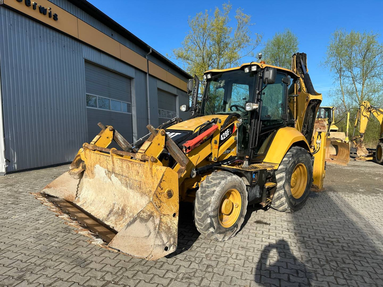 CAT 428F2 - Kotrórakodó: 1 kép. CAT 428F2 - Kotrórakodó: 1 kép.