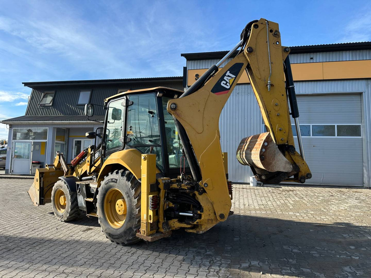 CAT 428F2 - Kotrórakodó: 4 kép. CAT 428F2 - Kotrórakodó: 4 kép.
