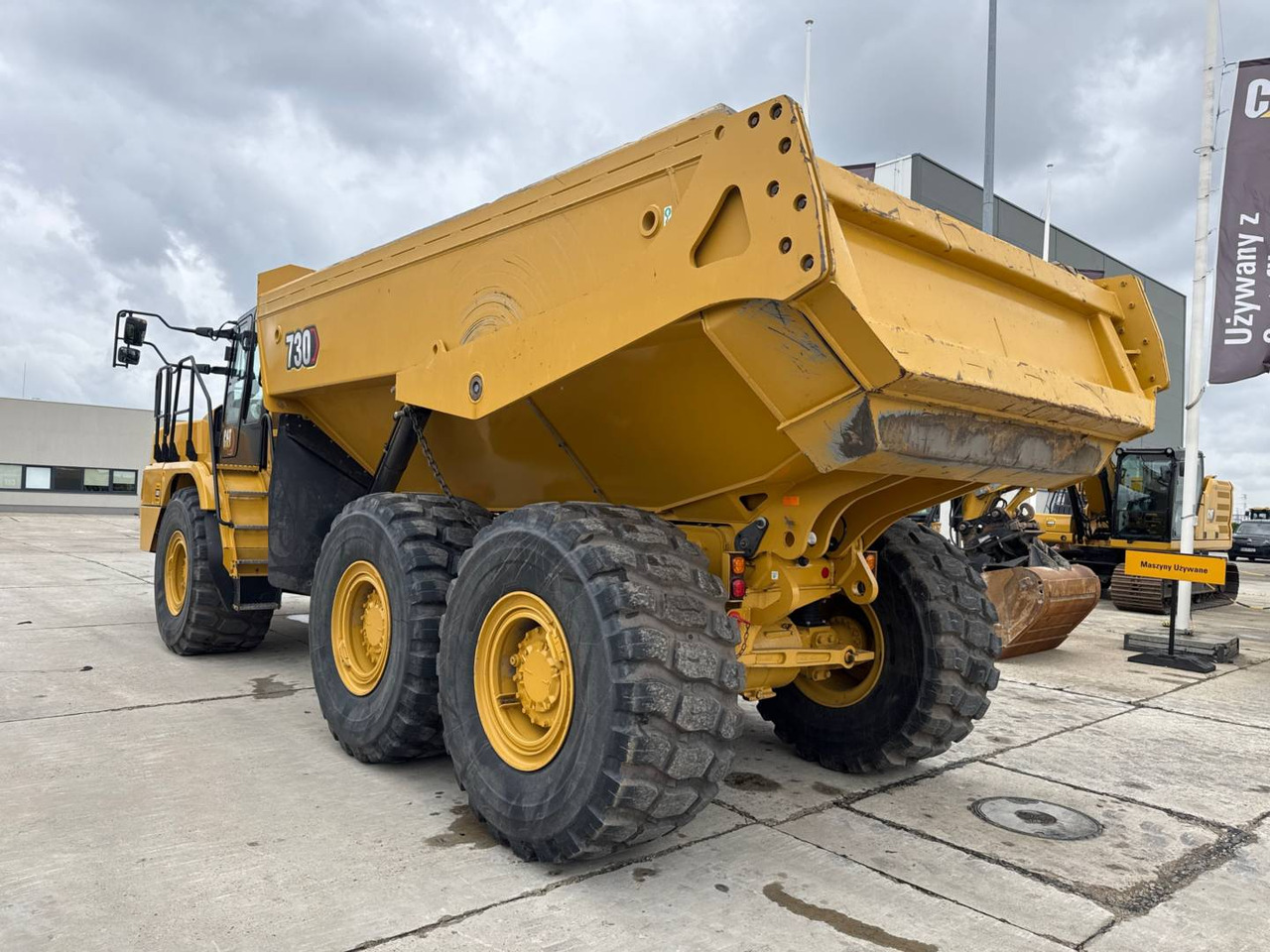 CAT 730 - Csuklós dömper: 4 kép. CAT 730 - Csuklós dömper: 4 kép.