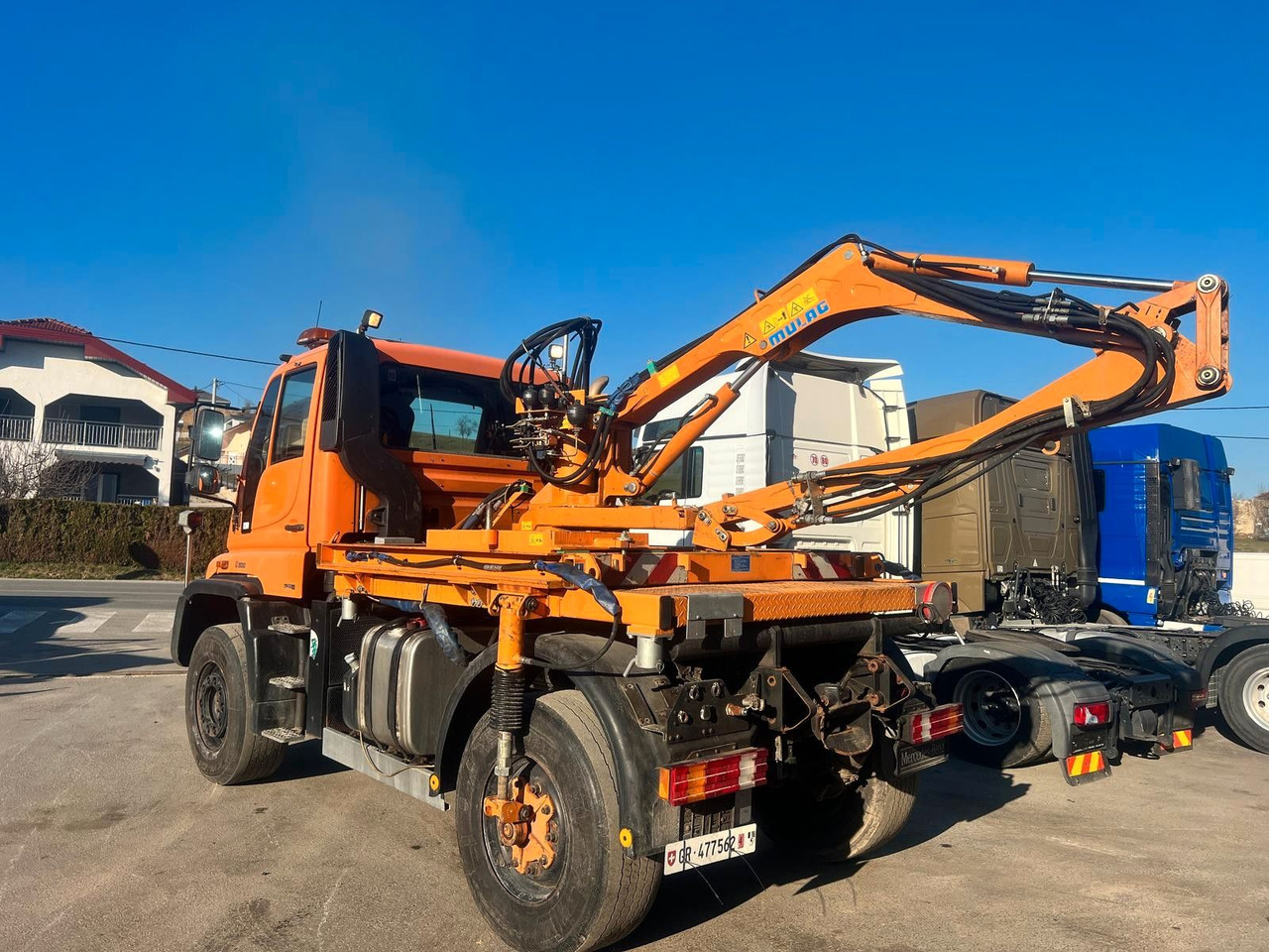 Unimog U500 4x4, Boeschungsmaehwerk Mulag - Teherautó: 1 kép. Unimog U500 4x4, Boeschungsmaehwerk Mulag - Teherautó: 1 kép.